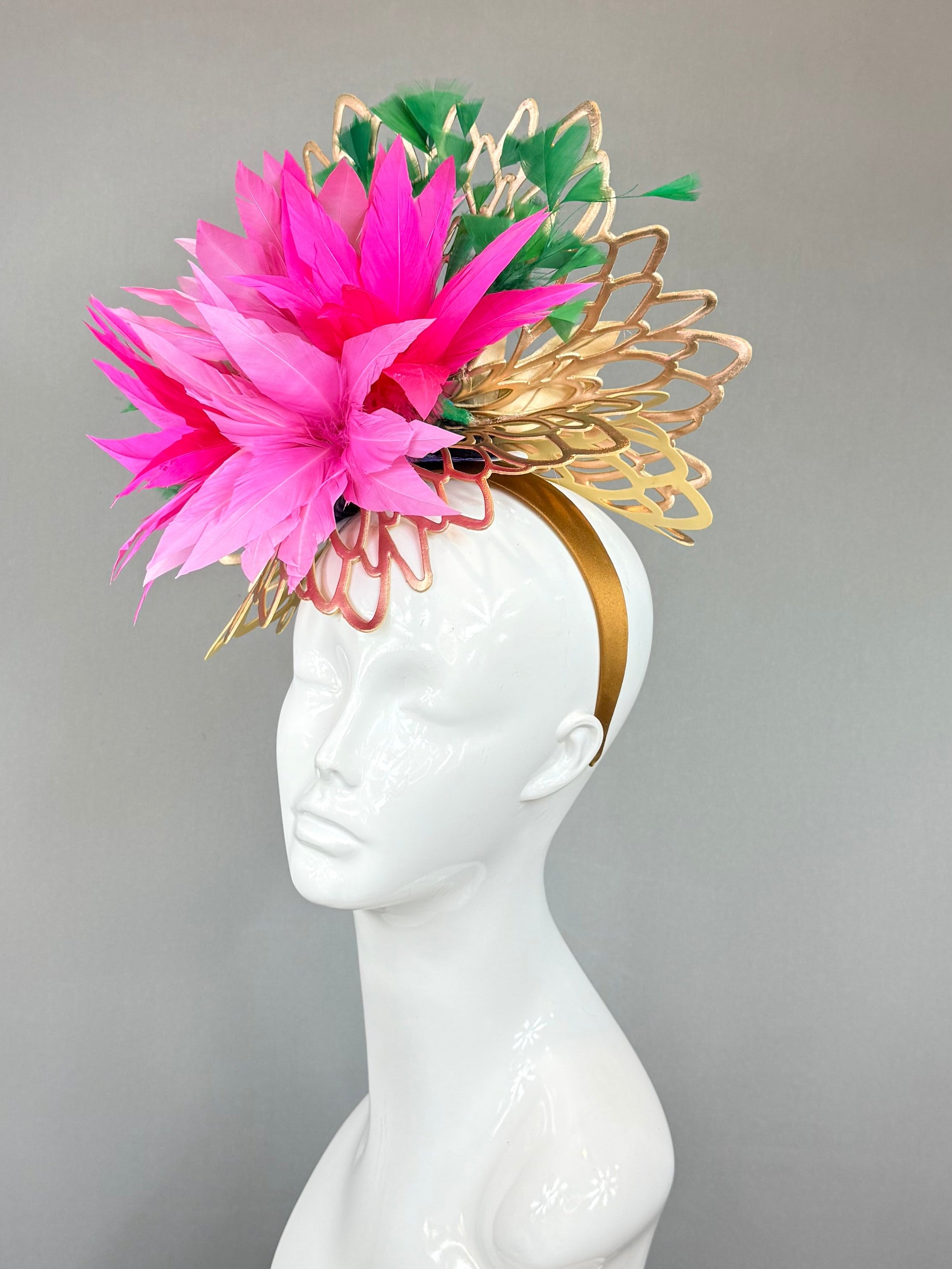 Pink and green exotic, floral head fascinator with gold wicker base