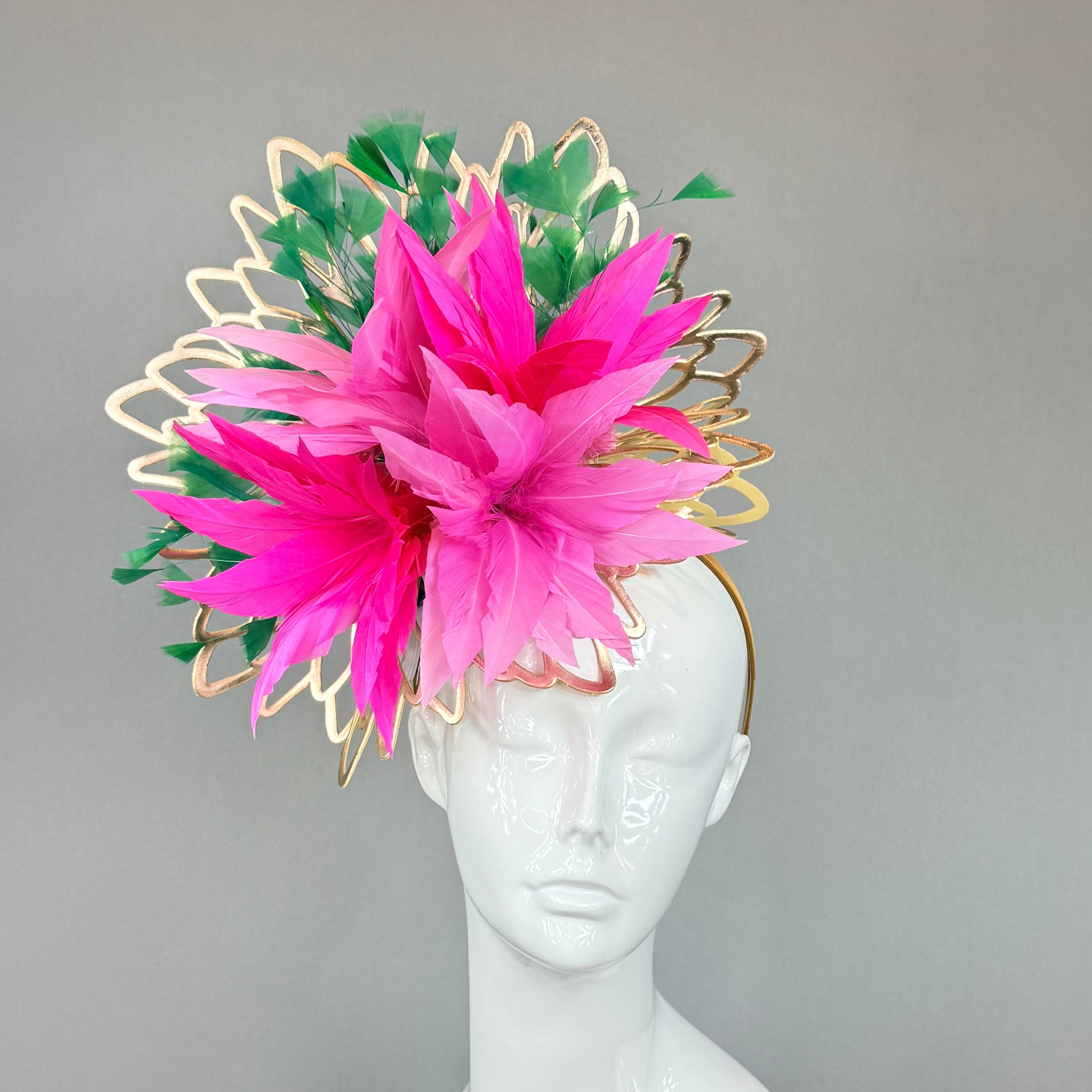 Pink and green exotic, floral head fascinator with gold wicker base