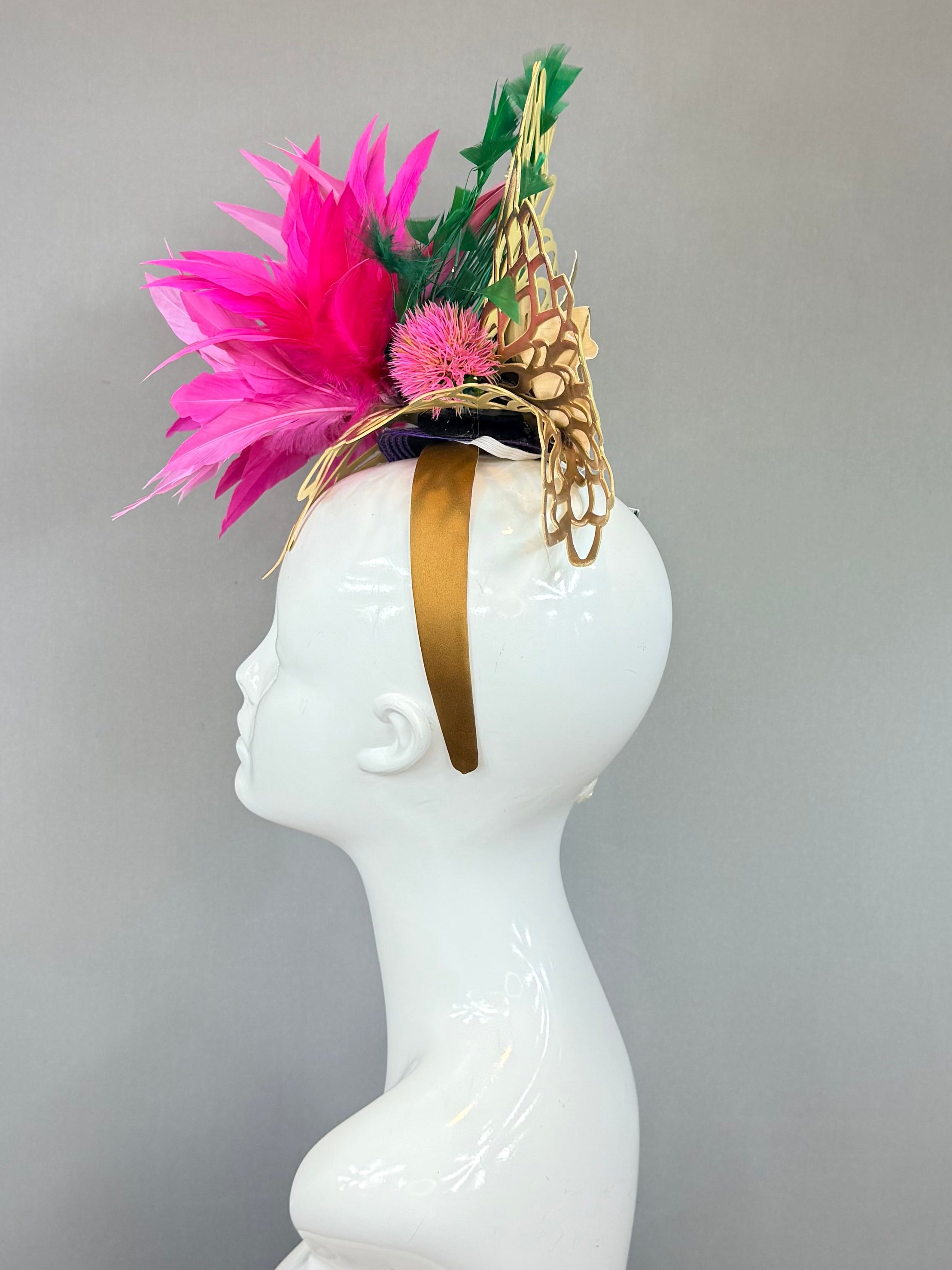 Pink and green exotic, floral head fascinator with gold wicker base