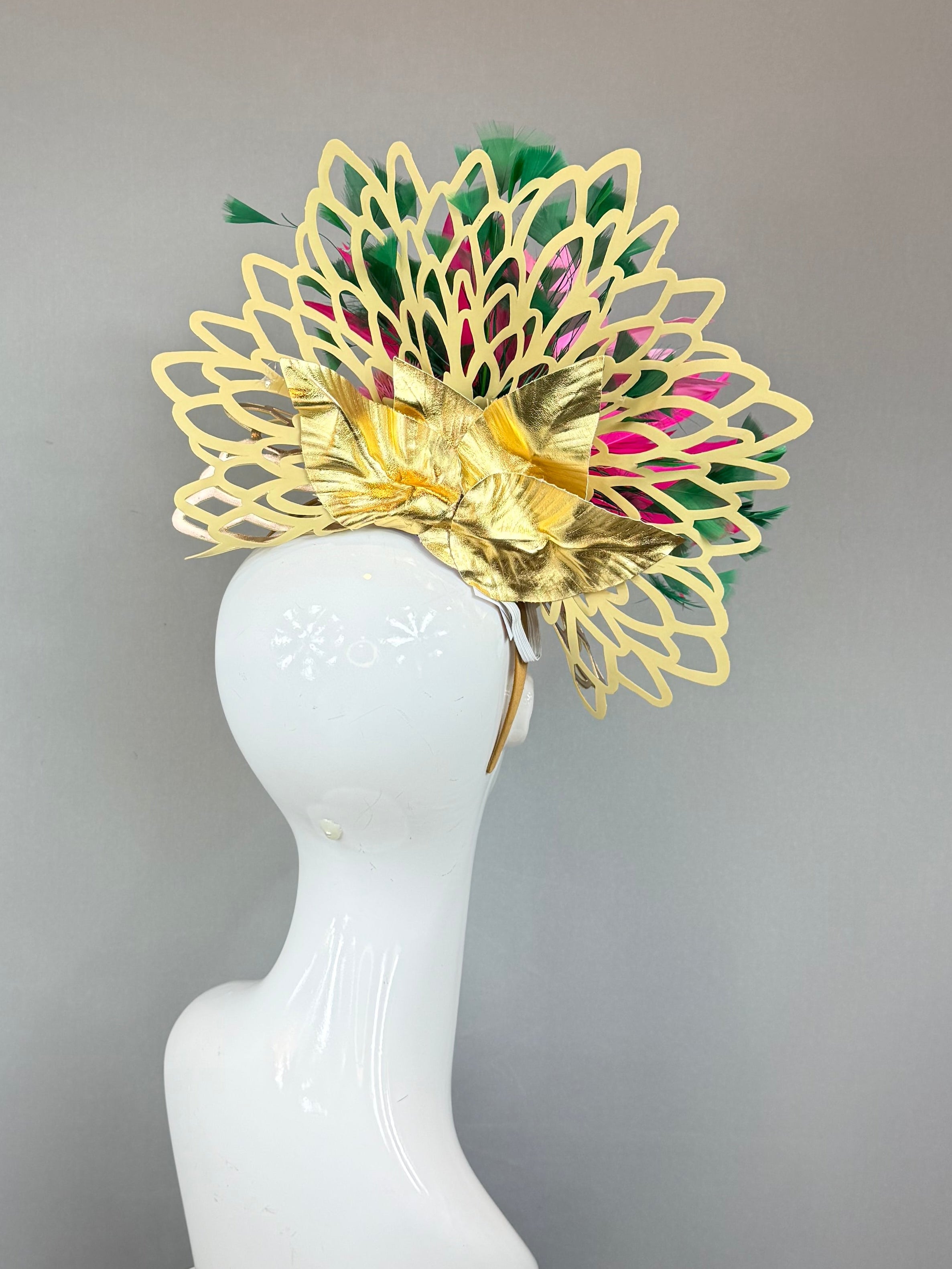 Pink and green exotic, floral head fascinator with gold wicker base