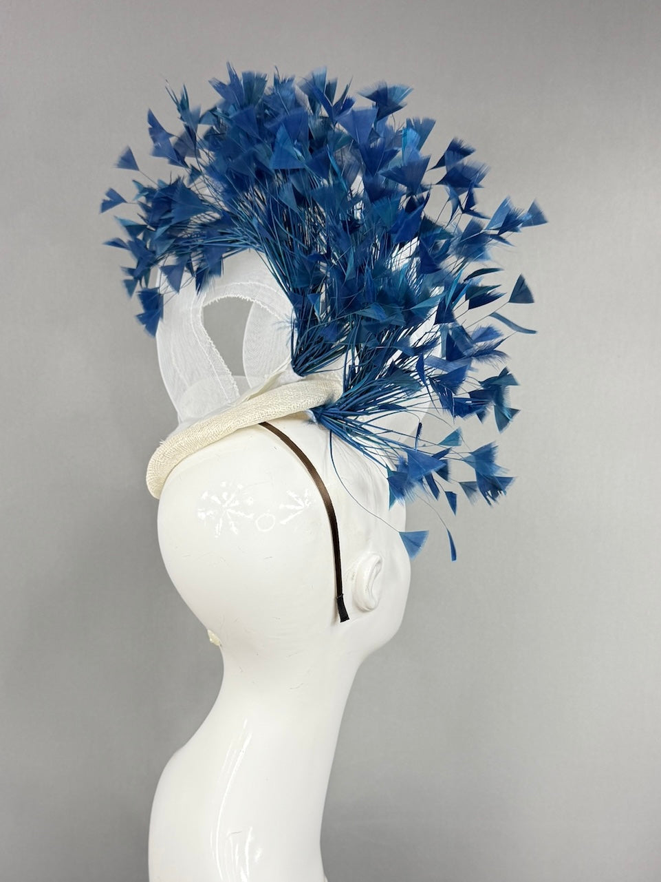 Kentucky Derby Fascinator Hat | Swirled, airy white crinoline loops with generous blue feather spray Headpiece | Derbyologie